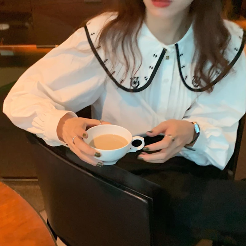 ZAWAHIKI Embroidered Elegant Chemise Femme Korean Chic Autumn Vintage Women Blouses Peter Pan Collar Blusas Mujer Puff Sleeve
ZAWAHIKI Embroidered Elegant Chemise Femme Korean Chic Autumn Vintage Women Blouses Peter Pan Collar Blusas Mujer Puff Sleeve