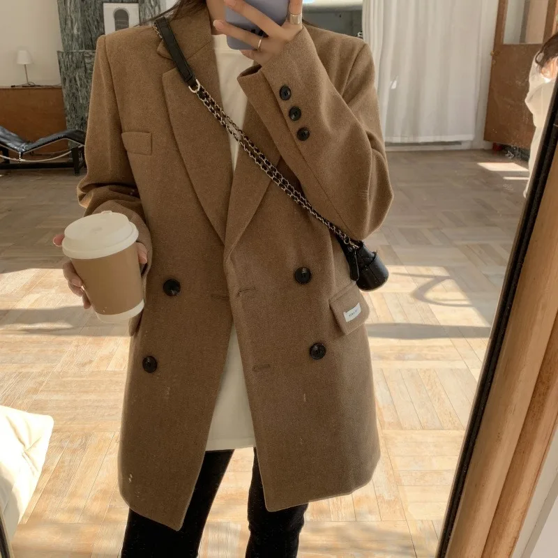 Temperament fashionable woolen coat women autumn and winter lapel long-sleeved loose Korean woolen coat 2021 new
Temperament fashionable woolen coat women autumn and winter lapel long-sleeved loose Korean woolen coat 2021 new