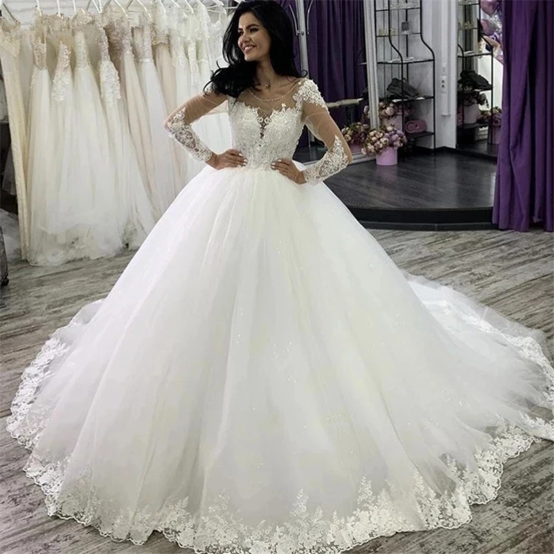 ANGELSBRIDEP Long Sleeves Ball Gown Tulle Wedding Dress Robe De Mariee Luxury Appliques Beaded Floor-Length Formal Bridal Gowns
ANGELSBRIDEP Long Sleeves Ball Gown Tulle Wedding Dress Robe De Mariee Luxury Appliques Beaded Floor-Length Formal Bridal Gowns
