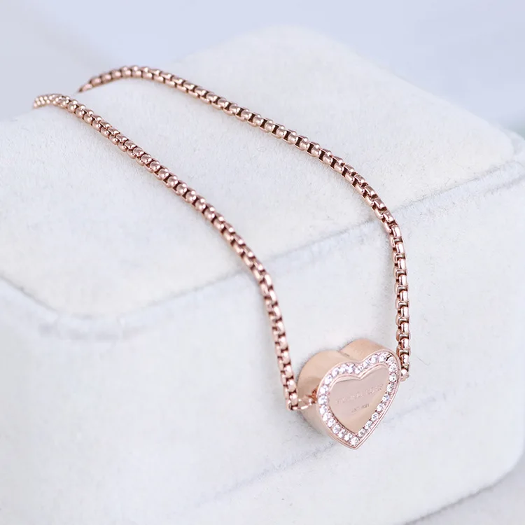 Stainless steel gold-plated diamond and love heart pull bean adjustable bracelet
Stainless steel gold-plated diamond and love heart pull bean adjustable bracelet