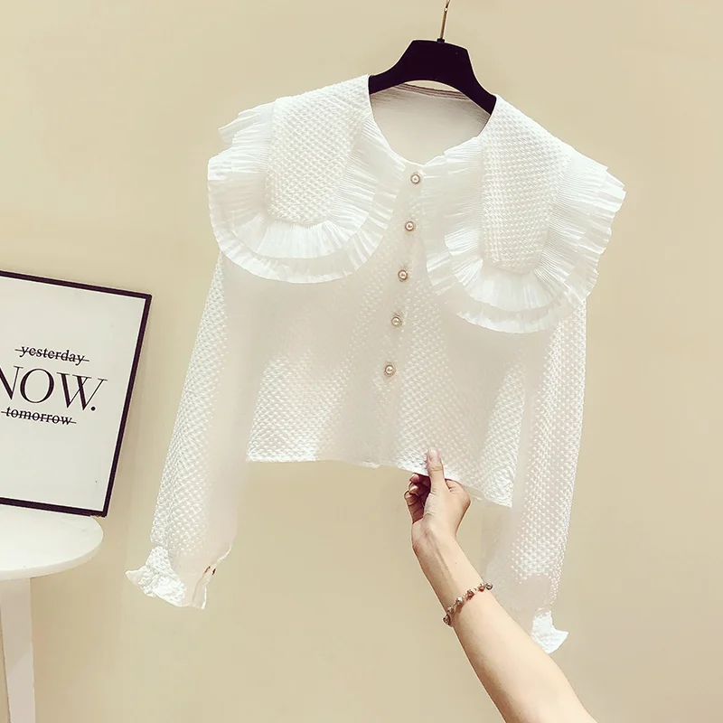 French Sweet Doll Collar Ruffled White Shirt Women's Spring and Autumn Western Style Shirt European Goods Trendy Fashionable
French Sweet Doll Collar Ruffled White Shirt Women's Spring and Autumn Western Style Shirt European Goods Trendy Fashionable