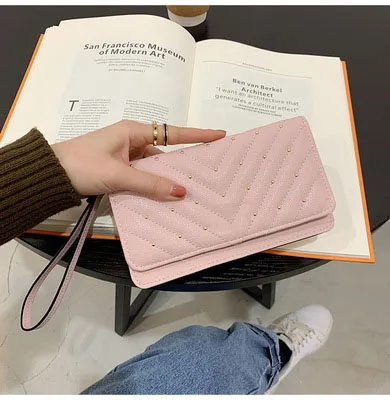 Wallet Ladies New Large Capacity Ladies Long Handbag Embroidery Screw Rivet Wallet
Wallet Ladies New Large Capacity Ladies Long Handbag Embroidery Screw Rivet Wallet