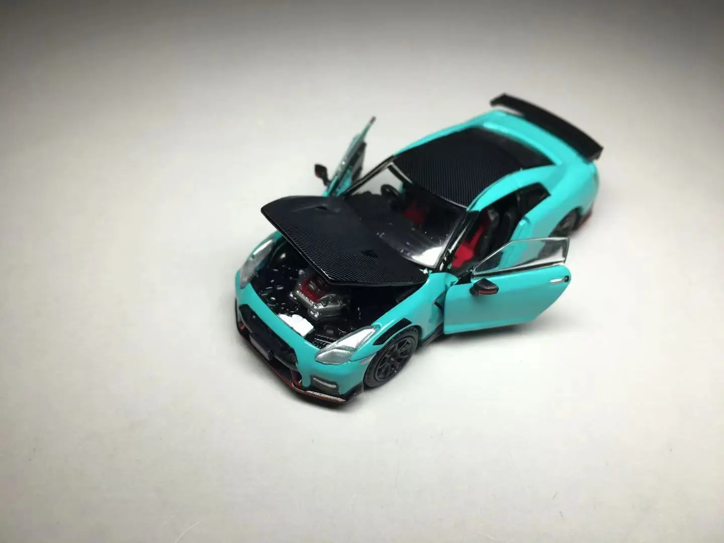 Эра 1/64 Nissan GT-R R35 Nismo 2020 Робин сине-зеленый литой модели автомобилей Коллекция Limited
Эра 1/64 Nissan GT-R R35 Nismo 2020 Робин сине-зеленый литой модели автомобилей Коллекция Limited