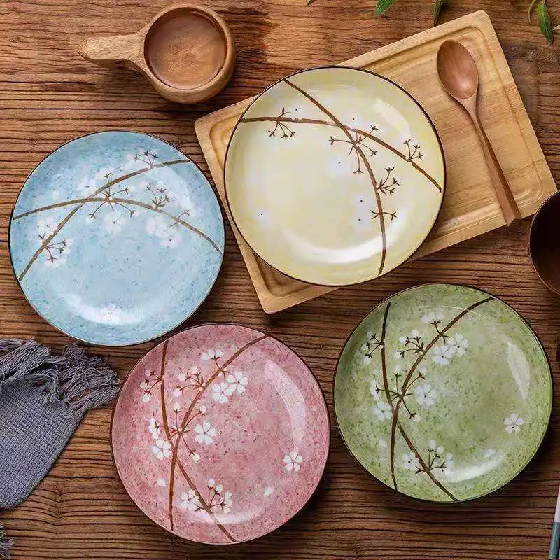 Ceramic plate Japanese household simple round Flower style A set of four and one in each of the four colors
Ceramic plate Japanese household simple round Flower style A set of four and one in each of the four colors