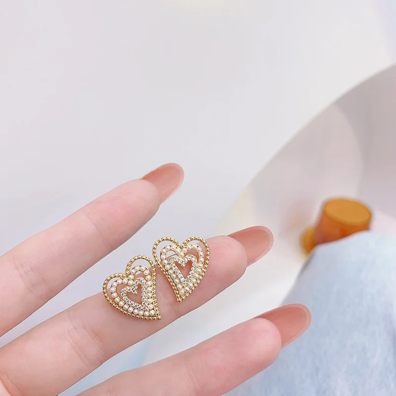 Korean women's earrings, fashion jewelry, love pearl earrings, simulated candy and romantic women, nut earrings, wholesale
Korean women's earrings, fashion jewelry, love pearl earrings, simulated candy and romantic women, nut earrings, wholesale