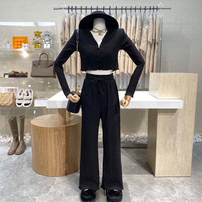 Niche Design Age-reducing V-neck Breasted Navel Top+drawstring High Waist Loose Wavy Wide-leg Trousers Two-piece Suit
Niche Design Age-reducing V-neck Breasted Navel Top+drawstring High Waist Loose Wavy Wide-leg Trousers Two-piece Suit