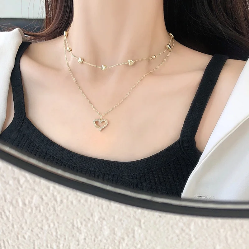 Fashion Layered Crystal Heart Pendant Necklace for Women Vintage Hollow Heart Chain Clavicle Necklace Bohemian Jewelry
Fashion Layered Crystal Heart Pendant Necklace for Women Vintage Hollow Heart Chain Clavicle Necklace Bohemian Jewelry