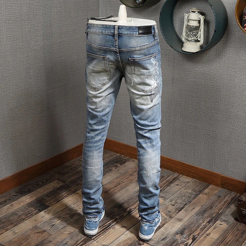 Newly High Street Fashion Men Jeans Light Blue Painted Designer Ripped Jeans Men Destroyed Pants Patchwork Hip Hop Jeans Homme
Newly High Street Fashion Men Jeans Light Blue Painted Designer Ripped Jeans Men Destroyed Pants Patchwork Hip Hop Jeans Homme