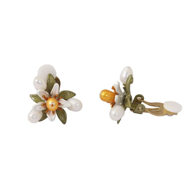 European and American New Fashion Temperament Earrings Orange Blossom Retro Painted Stud Earring Without pierced Ear Clip Female
European and American New Fashion Temperament Earrings Orange Blossom Retro Painted Stud Earring Without pierced Ear Clip Female