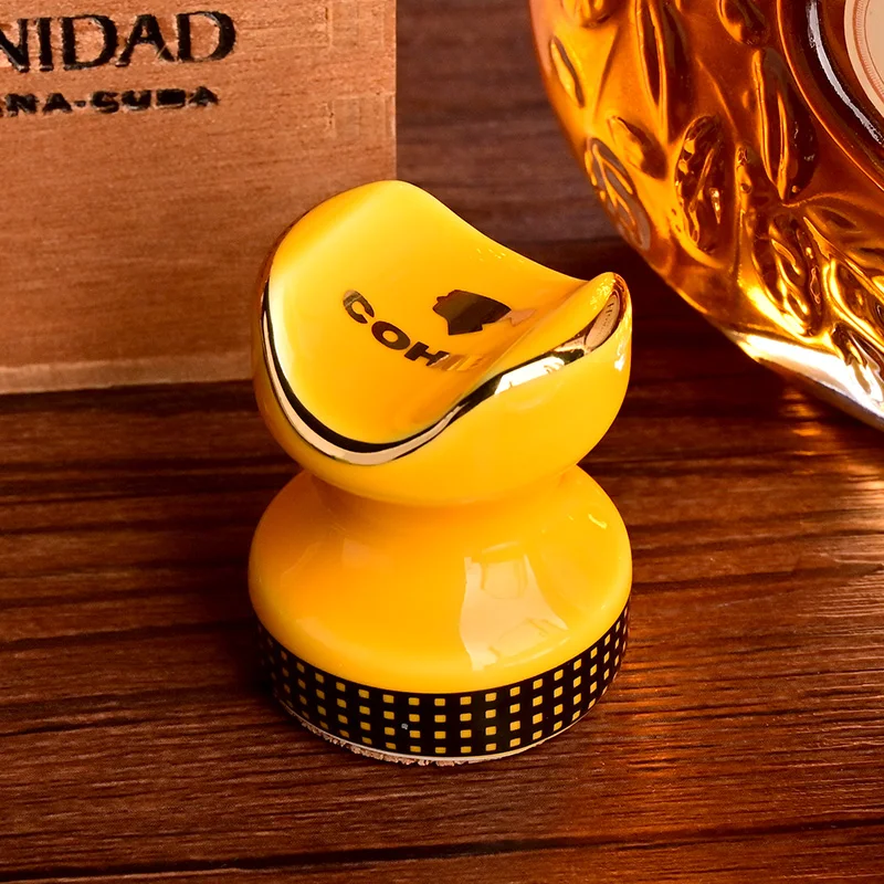 COHIBA Пепельница держатель Портативный керамика сигары держатель стойки Карманный Мини Путешествия курительных принадлежностей CLG-KH01
COHIBA Пепельница держатель Портативный керамика сигары держатель стойки Карманный Мини Путешествия курительных принадлежностей CLG-KH01