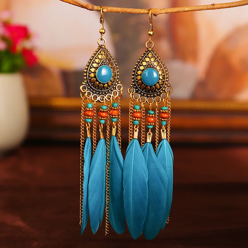 Fashion Feather Earrings Female Bohemian Diamond-Studded Rice Bead Earrings Long Tassels Retro Party Earrings Ethnic Style
Fashion Feather Earrings Female Bohemian Diamond-Studded Rice Bead Earrings Long Tassels Retro Party Earrings Ethnic Style