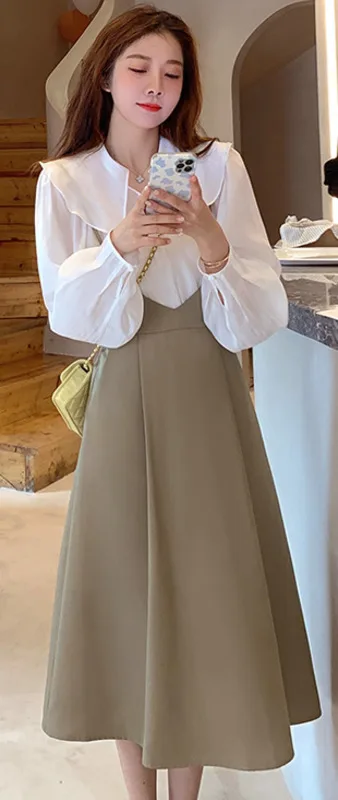 Цельнокроеное платье для ранней осени, женский маленький костюм, новинка 2021, французская шикарная рубашка, юбка на бретелях, комплект из дву...
Цельнокроеное платье для ранней осени, женский маленький костюм, новинка 2021, французская шикарная рубашка, юбка на бретелях, комплект из дву...