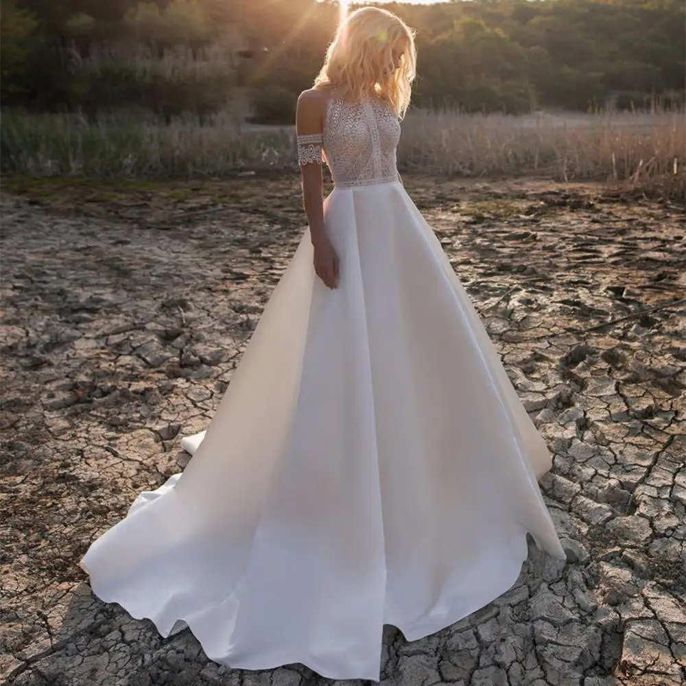 Custom Made Bohemian Wedding Dresses Open Back Halter Satin Lace Sexy Elegant Long Formal Bridal Wedding Gowns RK02
Custom Made Bohemian Wedding Dresses Open Back Halter Satin Lace Sexy Elegant Long Formal Bridal Wedding Gowns RK02