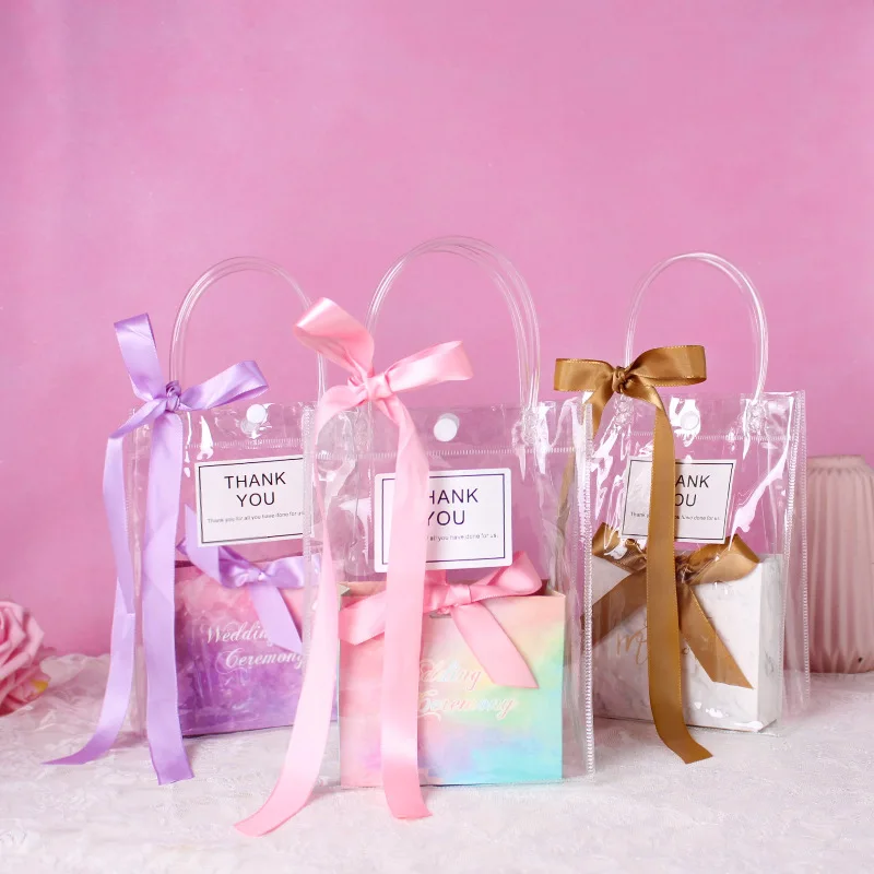 PVC Transparent Tote Bag Ribbon Candy Gift Box Package Bags Wedding Bridesmaid Gift Dragee Packaging Party Wrapping with Box
PVC Transparent Tote Bag Ribbon Candy Gift Box Package Bags Wedding Bridesmaid Gift Dragee Packaging Party Wrapping with Box