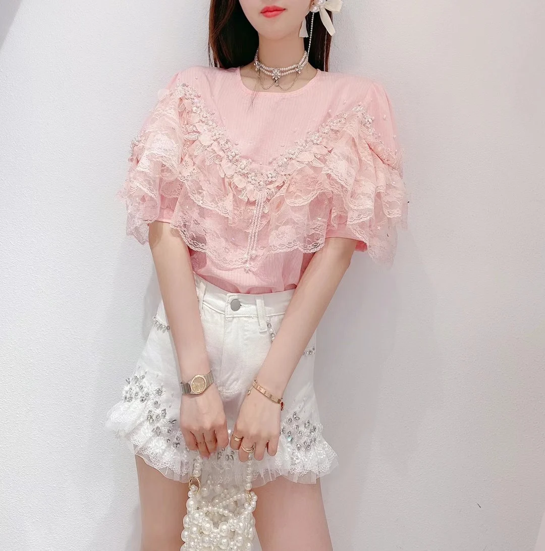 2021 Summer New Loose Round Neck Ruffled Beaded White Chiffon Shirt Short Sleeve Sweet Ladies Top Fashion O-neck Pullover Blusas
2021 Summer New Loose Round Neck Ruffled Beaded White Chiffon Shirt Short Sleeve Sweet Ladies Top Fashion O-neck Pullover Blusas
