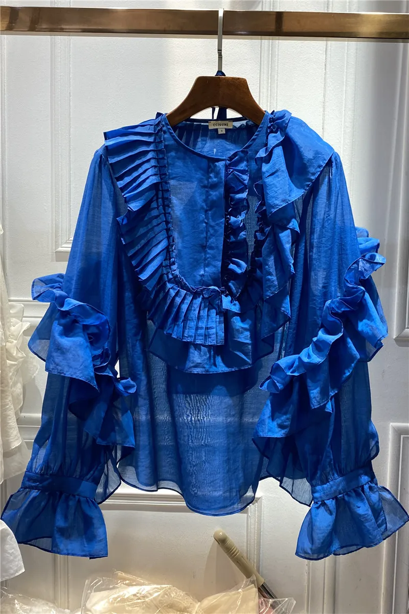 Ruffled silk cotton shirt ladies' spring 2021 new ruffles folded two-piece sweet top
Ruffled silk cotton shirt ladies' spring 2021 new ruffles folded two-piece sweet top