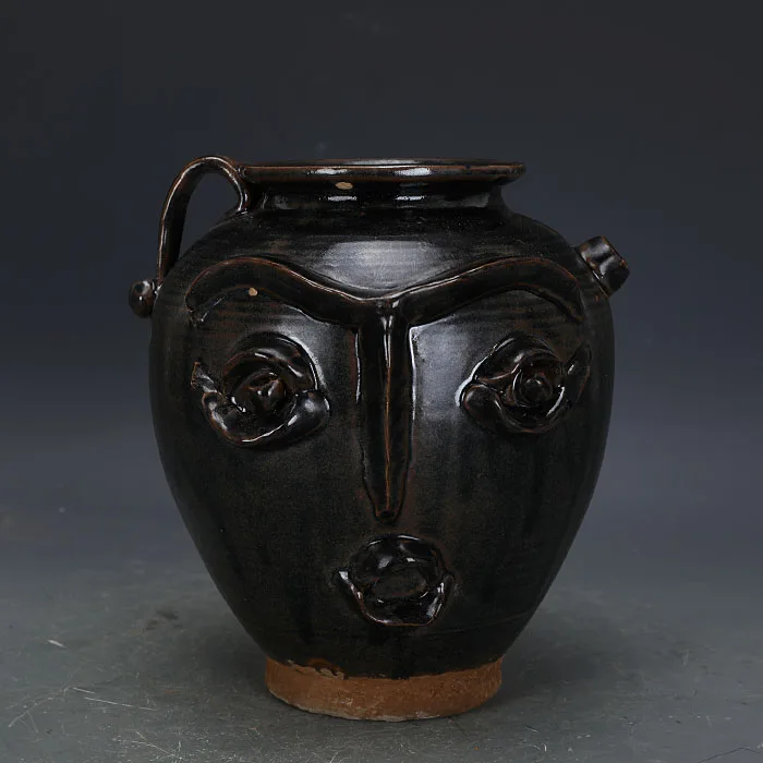 15 days validity:Song Dynasty Jian Kiln Black Glazed Hand-carved Smiling Face Holding Pot
15 days validity:Song Dynasty Jian Kiln Black Glazed Hand-carved Smiling Face Holding Pot