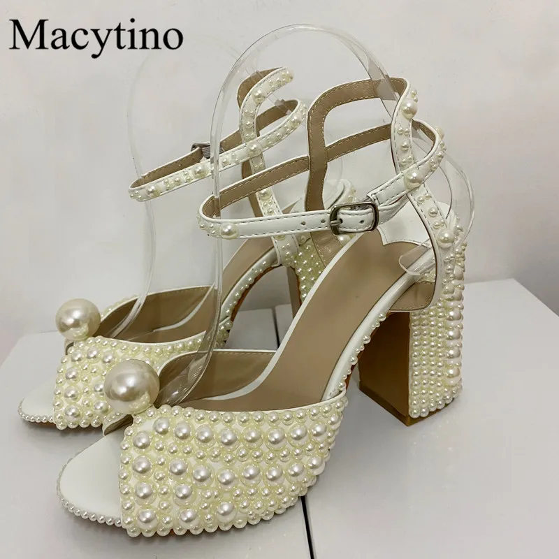 Size pearl design ladies high heel sandals round toe thick heel high heel sandals summer fashion party sandals
Size pearl design ladies high heel sandals round toe thick heel high heel sandals summer fashion party sandals