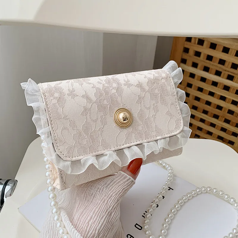 Luxury designer bags 2021 new fairy gentle wind pearl chain decoration messenger bag lace commuter small bag messenger female
Luxury designer bags 2021 new fairy gentle wind pearl chain decoration messenger bag lace commuter small bag messenger female
