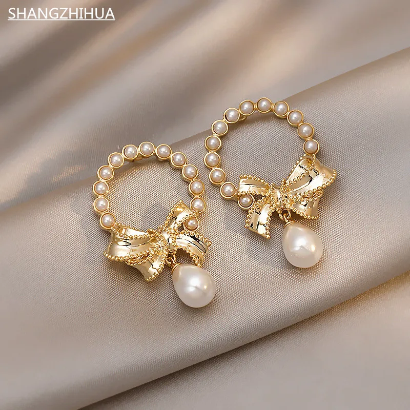 2021 Jewelry Exquisite Bow High Imitation Pearl Pendant Earrings For Women's Luxury Fashion Unusual Jewelry Gift Accessories
2021 Jewelry Exquisite Bow High Imitation Pearl Pendant Earrings For Women's Luxury Fashion Unusual Jewelry Gift Accessories
