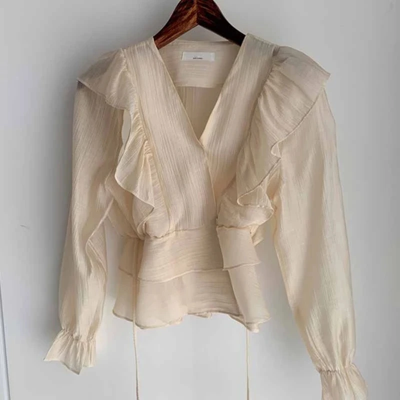 V Neck Ruffles Patchwork Women Shirts and Blouses Lantern Sleeve Solid Casual Loose Blusas Tops
V Neck Ruffles Patchwork Women Shirts and Blouses Lantern Sleeve Solid Casual Loose Blusas Tops