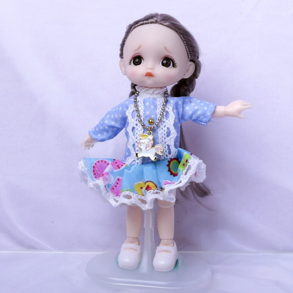 17 cm BJD Mini Doll 13 Movable Joint Girl Baby 3D Big Eyes Beautiful DIY Toy Doll With Clothes Dress Up 1/12 Fashion blue Doll
17 cm BJD Mini Doll 13 Movable Joint Girl Baby 3D Big Eyes Beautiful DIY Toy Doll With Clothes Dress Up 1/12 Fashion blue Doll