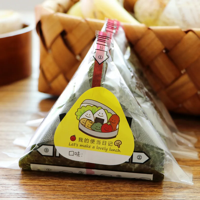 50 A-level Triangular Rice Ball Packaging Bags with Stickers Japanese-style Rice Ball Sushi Take-away Convenient Packaging
50 A-level Triangular Rice Ball Packaging Bags with Stickers Japanese-style Rice Ball Sushi Take-away Convenient Packaging