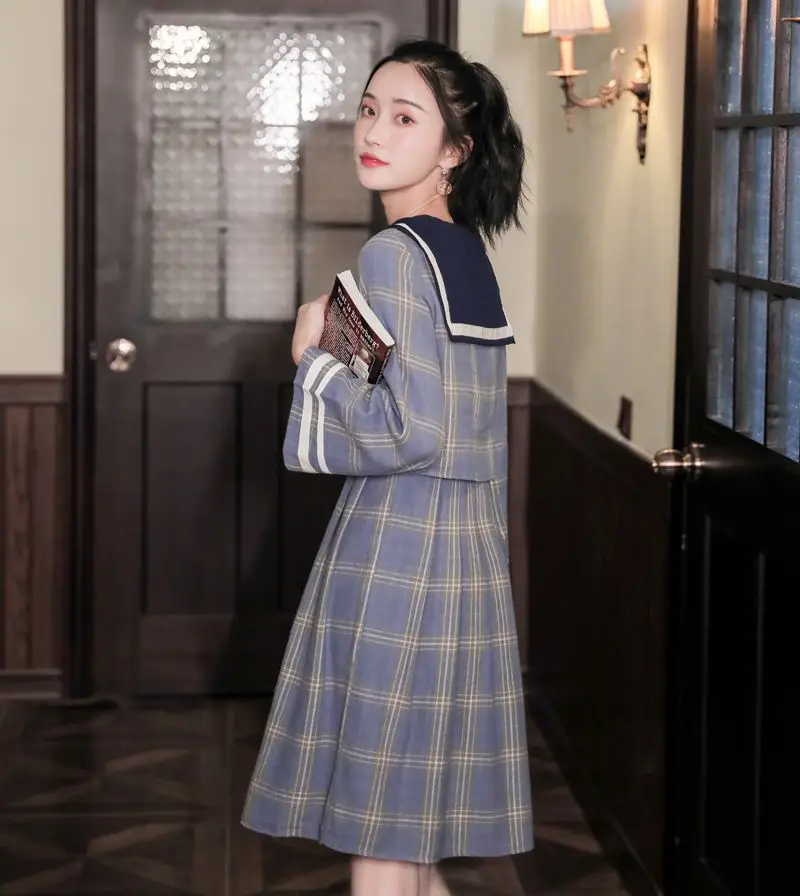 Retro navy collar dress fake two-piece plaid skirt college wind female autumn 2019 new
Retro navy collar dress fake two-piece plaid skirt college wind female autumn 2019 new
