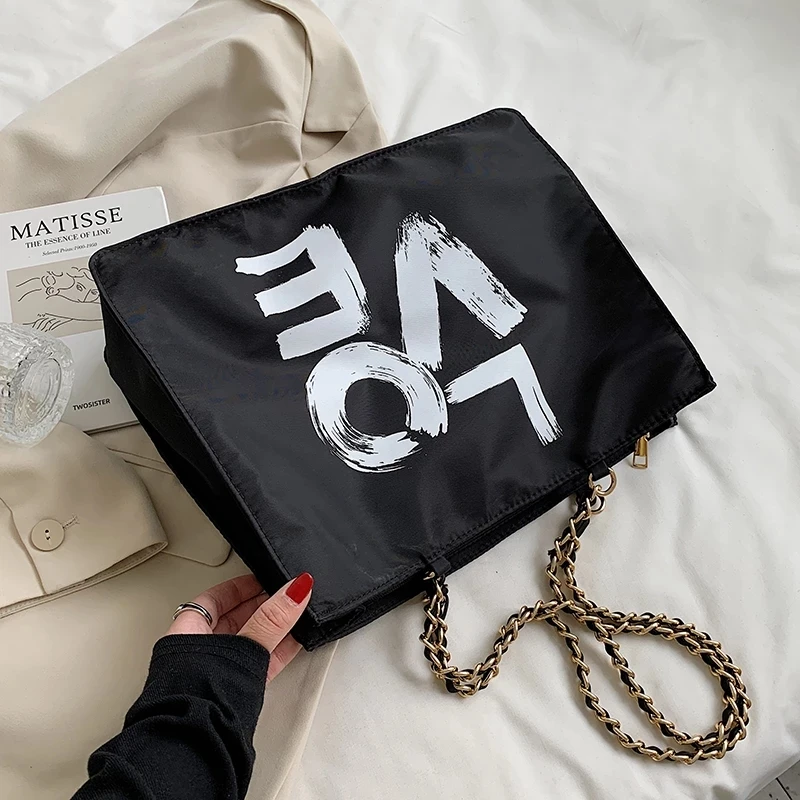 Letter Designer Shoulder Bag Casual Large Capacity 2021 Fashion Summer Nylon Women Handbag Shopping Waterproof Chain
Letter Designer Shoulder Bag Casual Large Capacity 2021 Fashion Summer Nylon Women Handbag Shopping Waterproof Chain