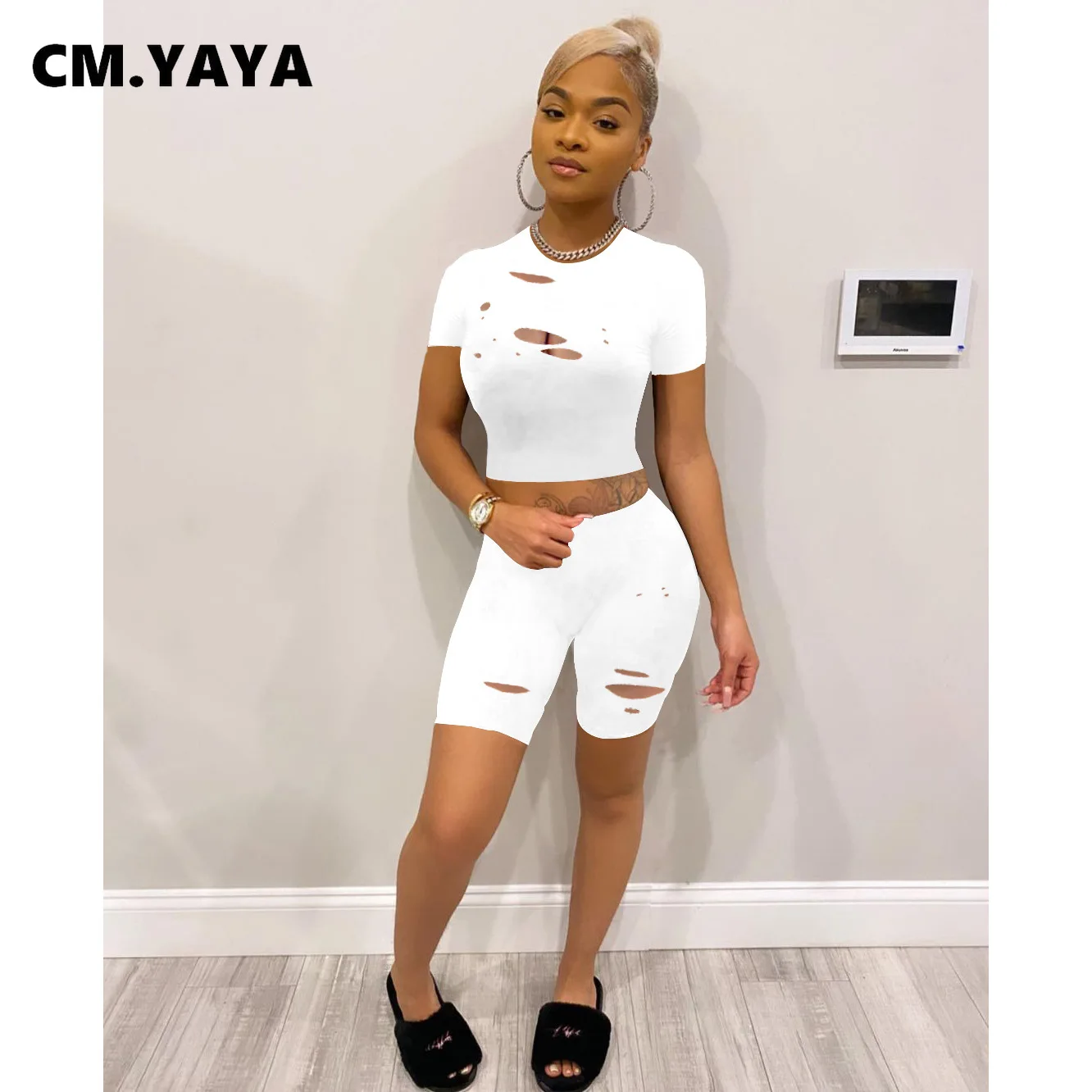Женский спортивный костюм CM.YAYA, однотонный комплект из двух предметов, короткий топ с дырками и шорты, спортивная одежда для активного отдых...
Женский спортивный костюм CM.YAYA, однотонный комплект из двух предметов, короткий топ с дырками и шорты, спортивная одежда для активного отдых...