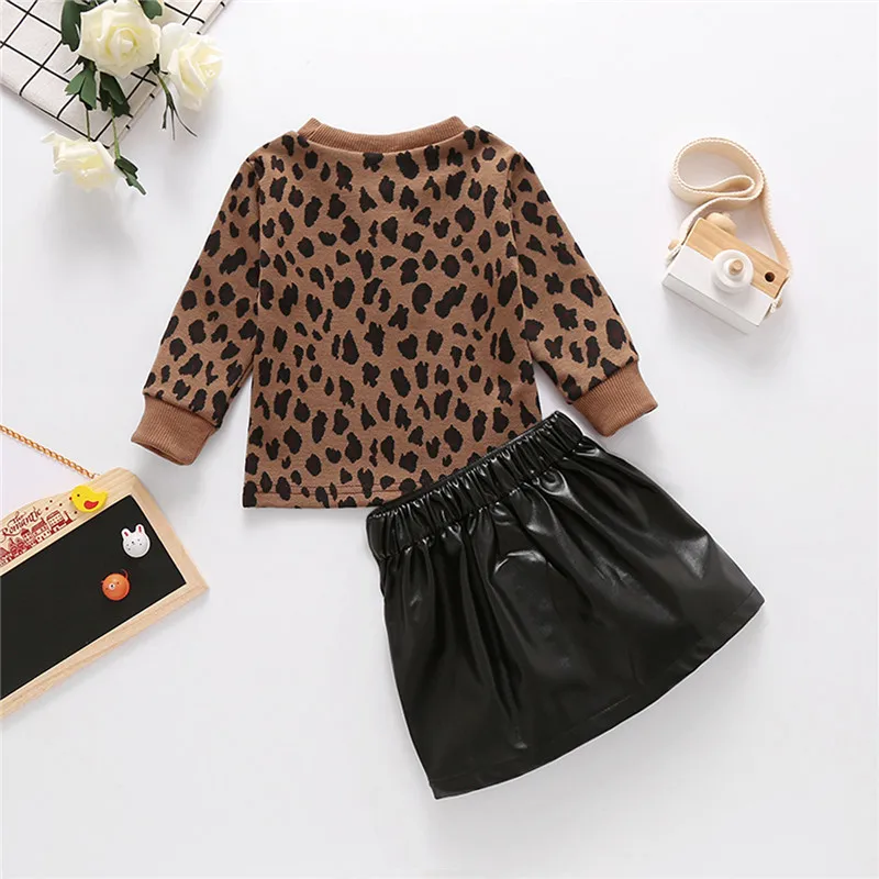 2020 Autumn Winter Girls Clothing Set Long Sleeve Pullover Leopard Sweater Tops PU Leather Skirt 2PCS Fashion Children Clothes 
2020 Autumn Winter Girls Clothing Set Long Sleeve Pullover Leopard Sweater Tops PU Leather Skirt 2PCS Fashion Children Clothes