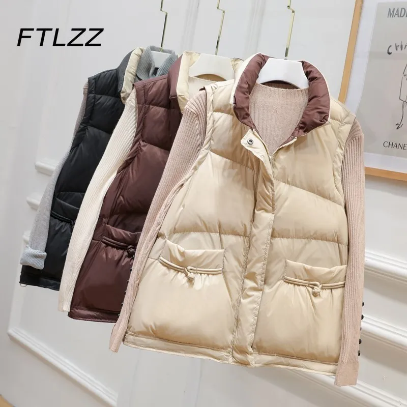 2021 New Women Down Vest Auutmn Winter Retro Sleeveless Loose Stand Collar Buckle Vest White Duck Down Jacket Female Waistcoat
2021 New Women Down Vest Auutmn Winter Retro Sleeveless Loose Stand Collar Buckle Vest White Duck Down Jacket Female Waistcoat