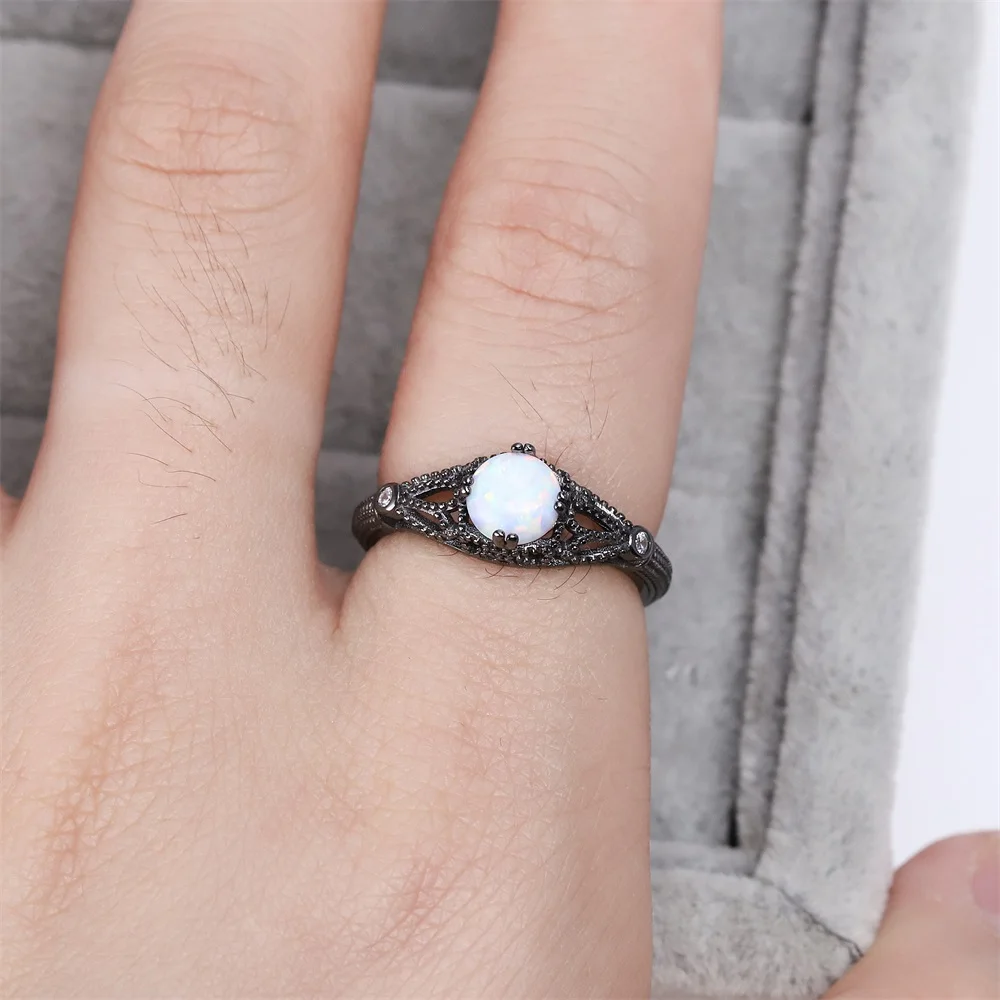 Best selling S925 silver fashion mysterious black wedding ring zircon Opal crystal creative jewelry women's gift
Best selling S925 silver fashion mysterious black wedding ring zircon Opal crystal creative jewelry women's gift