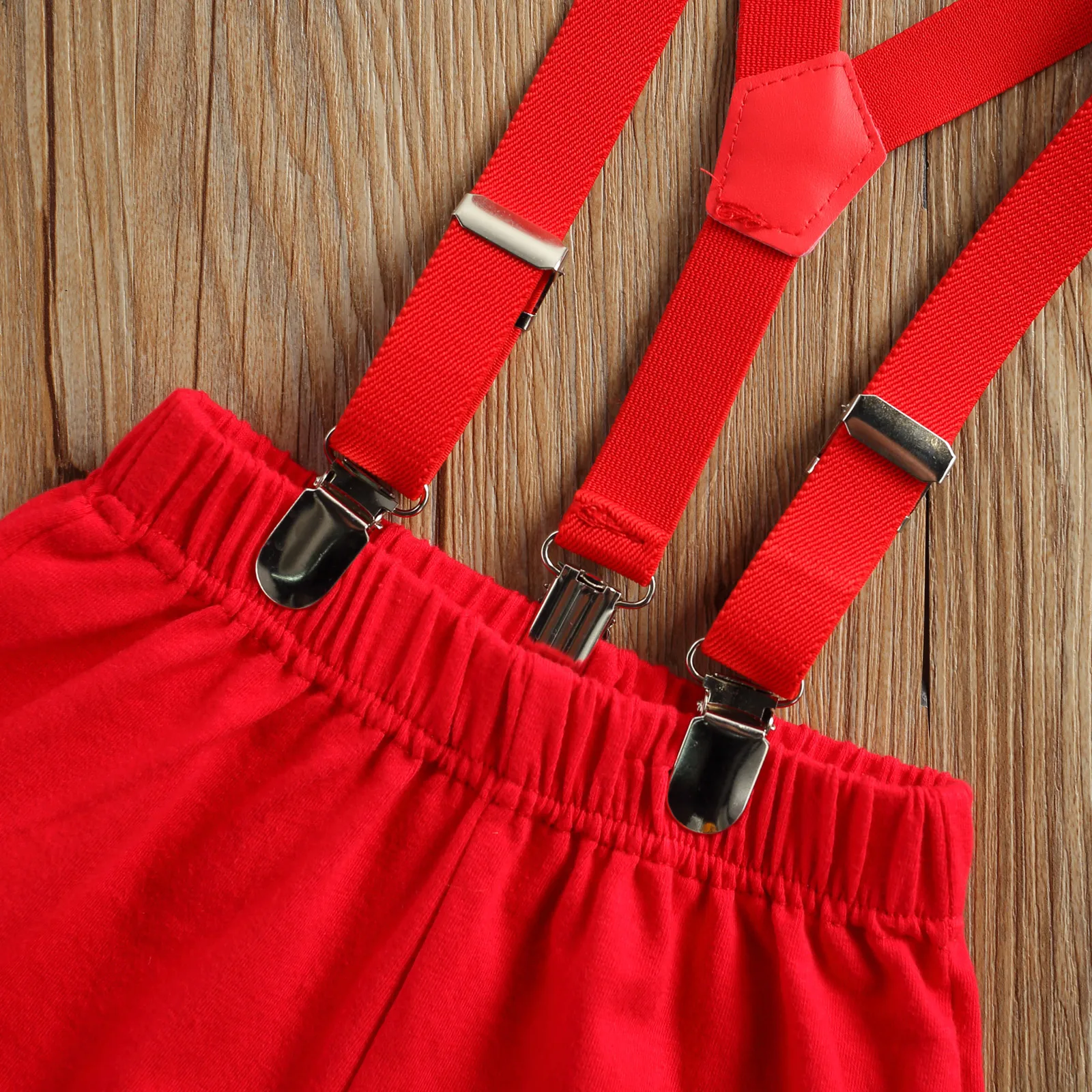 Boy\u2019s 2Pcs Gentleman Clothes Set Short Sleeve Bow Tie Decorations Solid Color Romper with Suspenders Short Pants
Boy\u2019s 2Pcs Gentleman Clothes Set Short Sleeve Bow Tie Decorations Solid Color Romper with Suspenders Short Pants