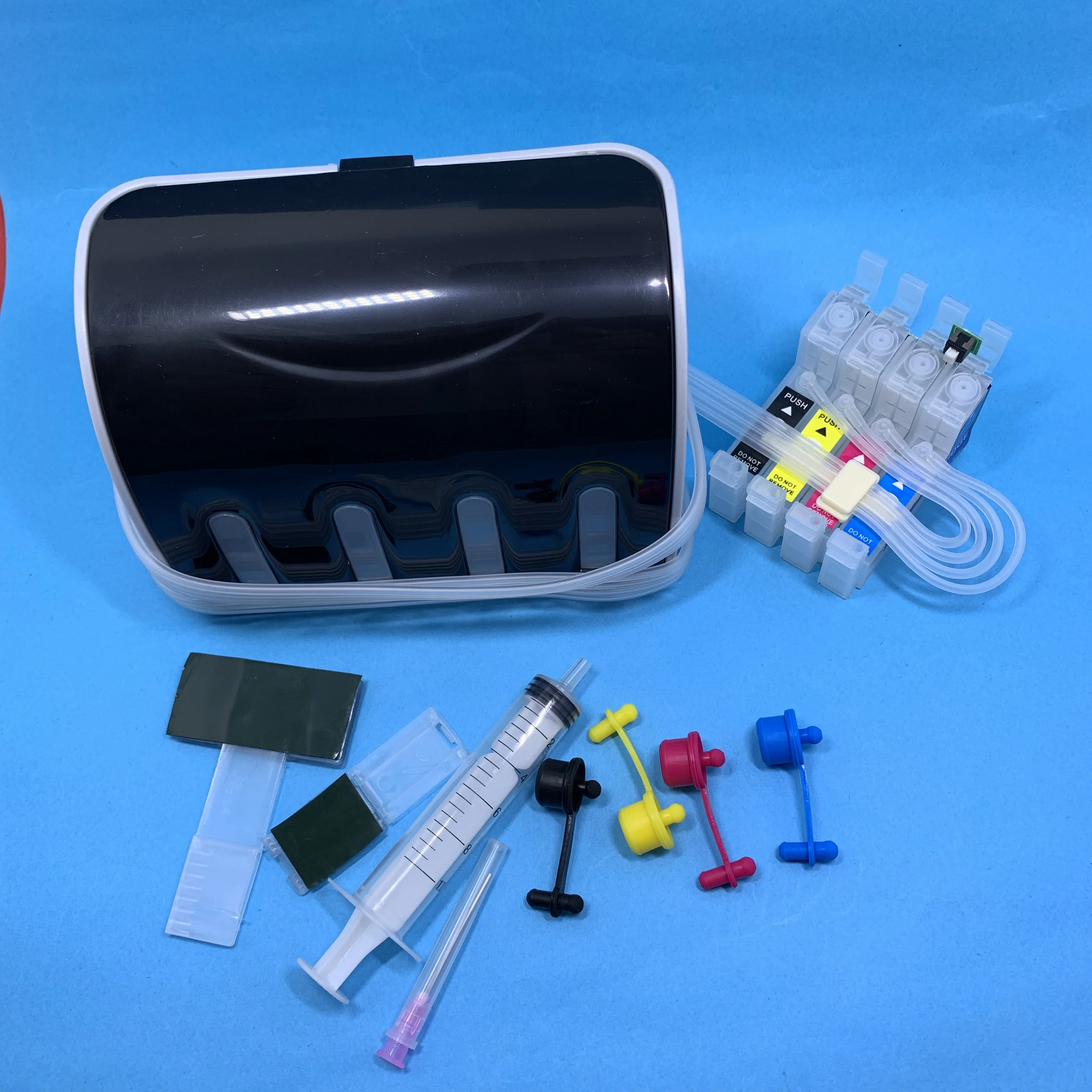 CISS System T1261 - T1264 ink cartridge for Epson WF-7010 WF-7510 WF-7520 WF-3540 WF3520 Stylus NX330 (North America) 
CISS System T1261 - T1264 ink cartridge for Epson WF-7010 WF-7510 WF-7520 WF-3540 WF3520 Stylus NX330 (North America)