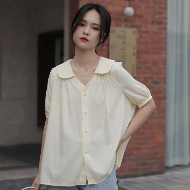 EleeMee 2021 Summer New Solid Color Shirt For Women Doll Collar Puff Sleeve Single Breasted Loose V Neck Tops Size S-Xl
EleeMee 2021 Summer New Solid Color Shirt For Women Doll Collar Puff Sleeve Single Breasted Loose V Neck Tops Size S-Xl