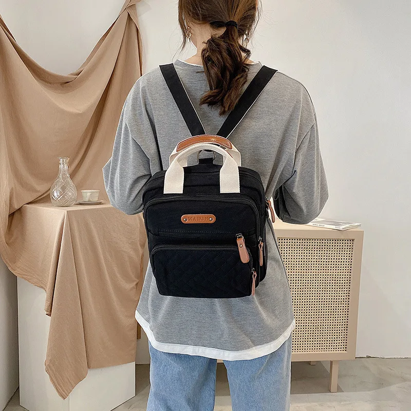 2021 Mummy Bag Stripe Large Capacity Canvas Satchel Multi Function Backpack Outdoor Women's Shoulder Bag
2021 Mummy Bag Stripe Large Capacity Canvas Satchel Multi Function Backpack Outdoor Women's Shoulder Bag