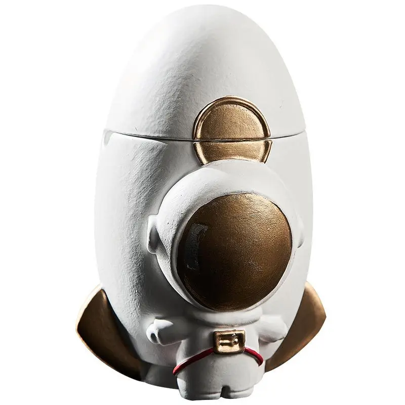 Personality creative anti-flying ash astronaut rocket with lid ashtray household coffee table ornaments
Personality creative anti-flying ash astronaut rocket with lid ashtray household coffee table ornaments