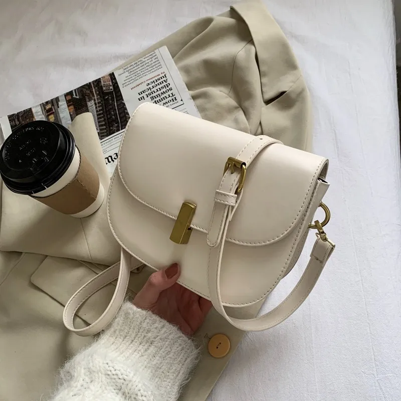 Fashion Womens Handbags Version Fresh Simple Retractable Shoulder Strap Saddle Bag Spring New Trend Pu Leather Face Light Purses 
Fashion Womens Handbags Version Fresh Simple Retractable Shoulder Strap Saddle Bag Spring New Trend Pu Leather Face Light Purses