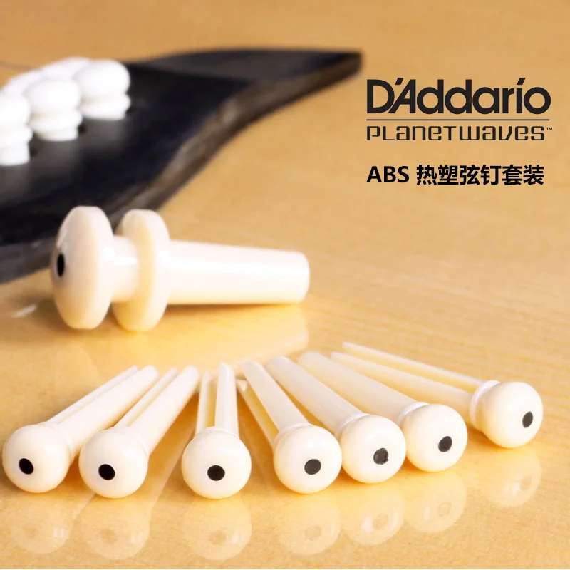 D'addario Planet Waves PWPS12 Injected Molded Bridge Pins with End Pin, Set of 7, Ivory with Black Dot
D'addario Planet Waves PWPS12 Injected Molded Bridge Pins with End Pin, Set of 7, Ivory with Black Dot