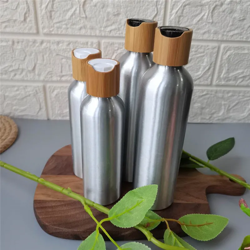 Aluminum Spray Bottle Portable Mini Perfume Bottles Empty Refillable Cosmetic Sprayer Atomizer with Bamboo Cap Disc Top 
Aluminum Spray Bottle Portable Mini Perfume Bottles Empty Refillable Cosmetic Sprayer Atomizer with Bamboo Cap Disc Top