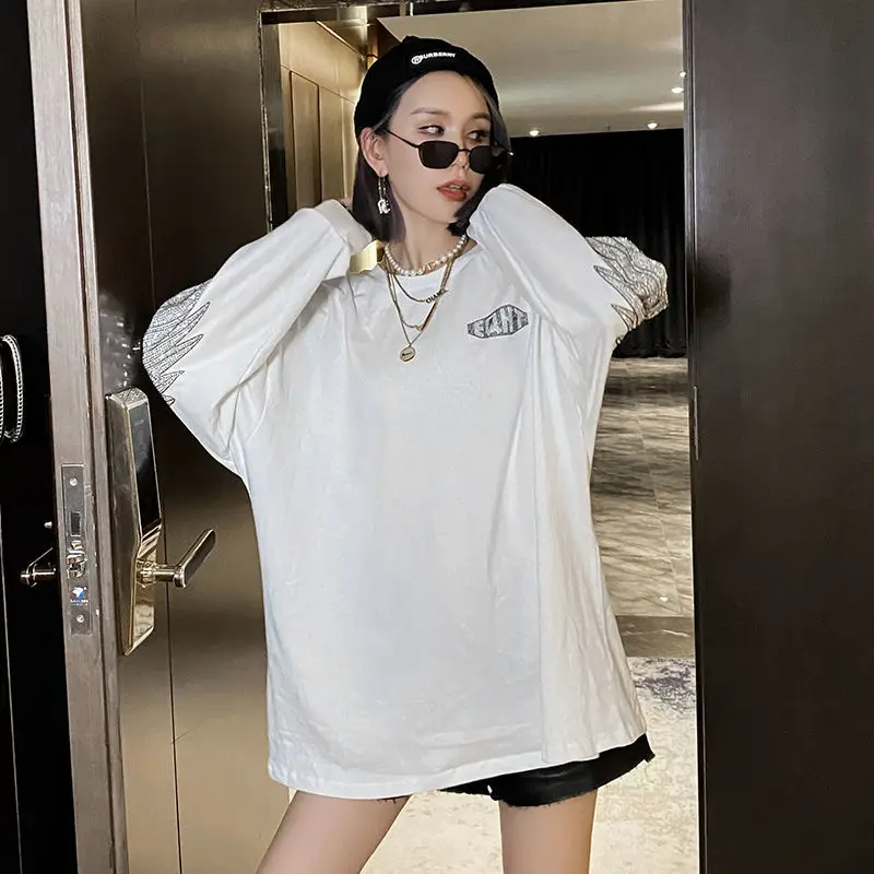Medium and long T-shirt women's long sleeve 2021 new loose heavy industry hot drill clothes missing coat tide
Medium and long T-shirt women's long sleeve 2021 new loose heavy industry hot drill clothes missing coat tide