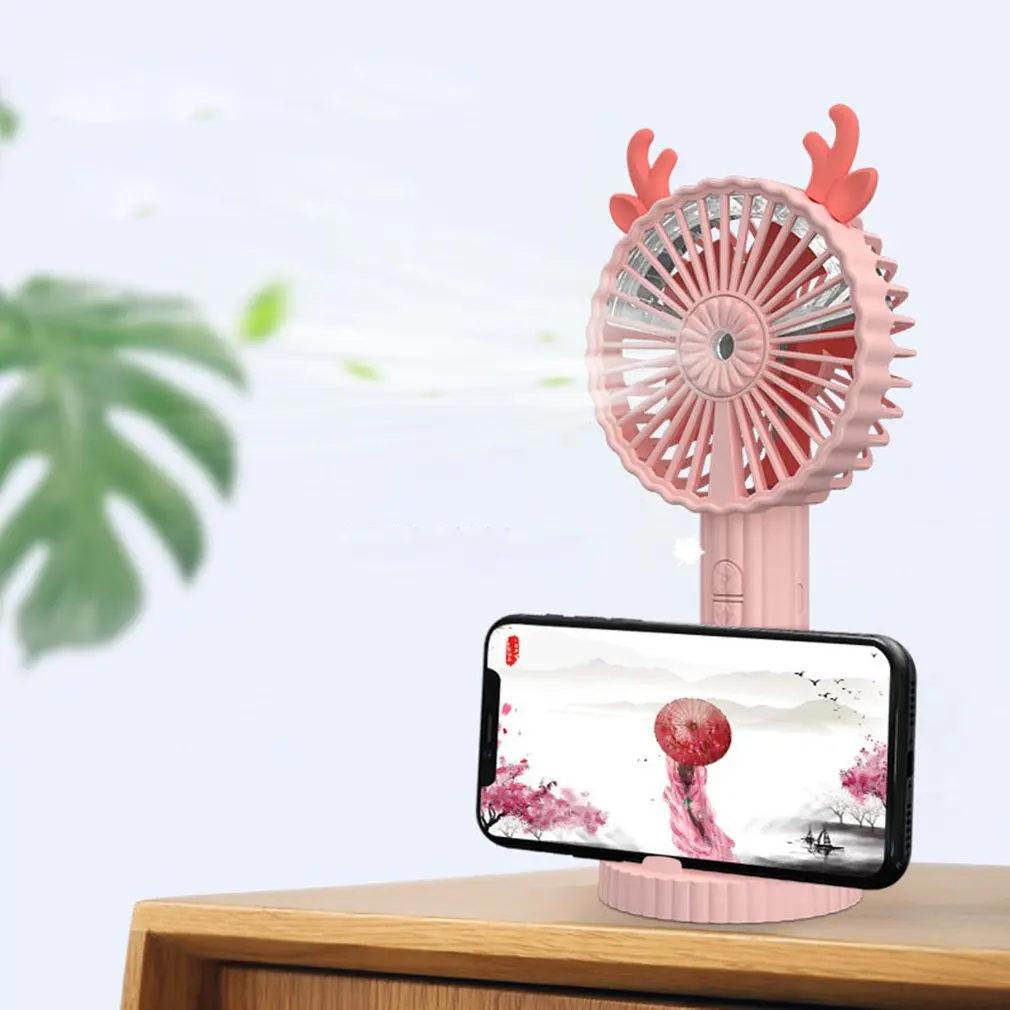 1pc Random Color Mini Antlers Fan Portable Handheld fan USB Rechargeable Desktop outdoor Air Cooler fan with phone stand
1pc Random Color Mini Antlers Fan Portable Handheld fan USB Rechargeable Desktop outdoor Air Cooler fan with phone stand