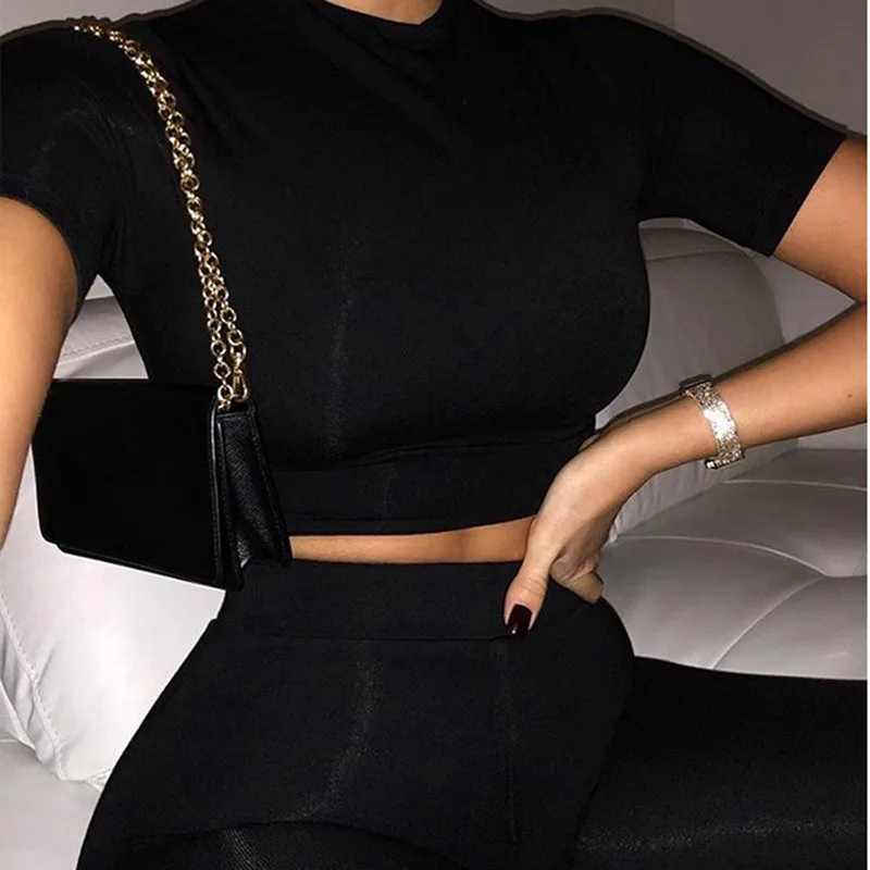 2021 Solid Casual Two Piece Sets Women Tracksuit Short Sleeve Tee + Leggings 2-pieces Spring Fashion Solid Black Pullovers Suits
2021 Solid Casual Two Piece Sets Women Tracksuit Short Sleeve Tee + Leggings 2-pieces Spring Fashion Solid Black Pullovers Suits