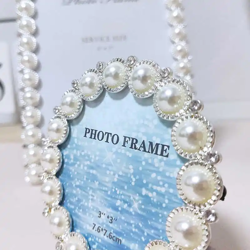 European 3 Inch 6 Inch 7 Inch Pearl Photo Frame Settable Metal Picture Frame Exquisite Diamond Round Mini Elegant Set Table
European 3 Inch 6 Inch 7 Inch Pearl Photo Frame Settable Metal Picture Frame Exquisite Diamond Round Mini Elegant Set Table