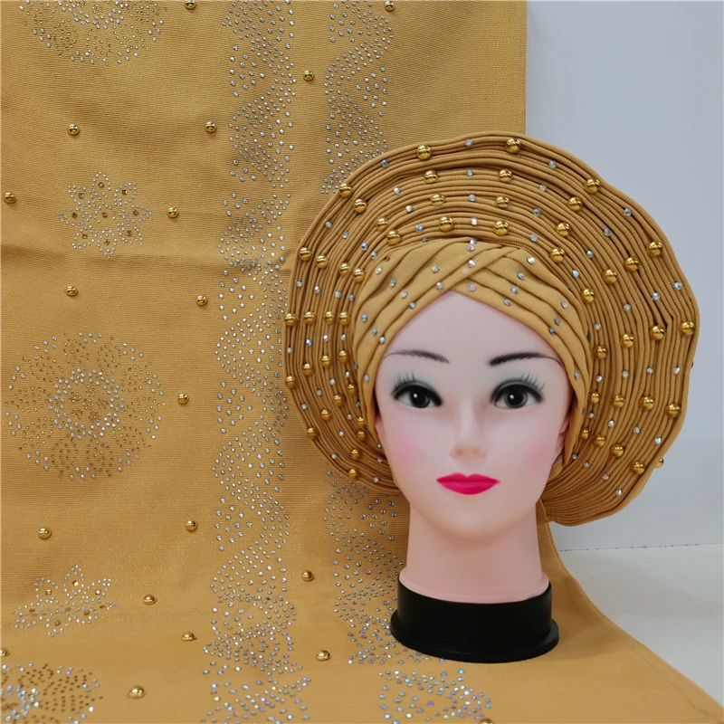 African Headtie With Beads And Stones Nigerian Oso Oke With Headtie Geles Sego Headscarf
African Headtie With Beads And Stones Nigerian Oso Oke With Headtie Geles Sego Headscarf