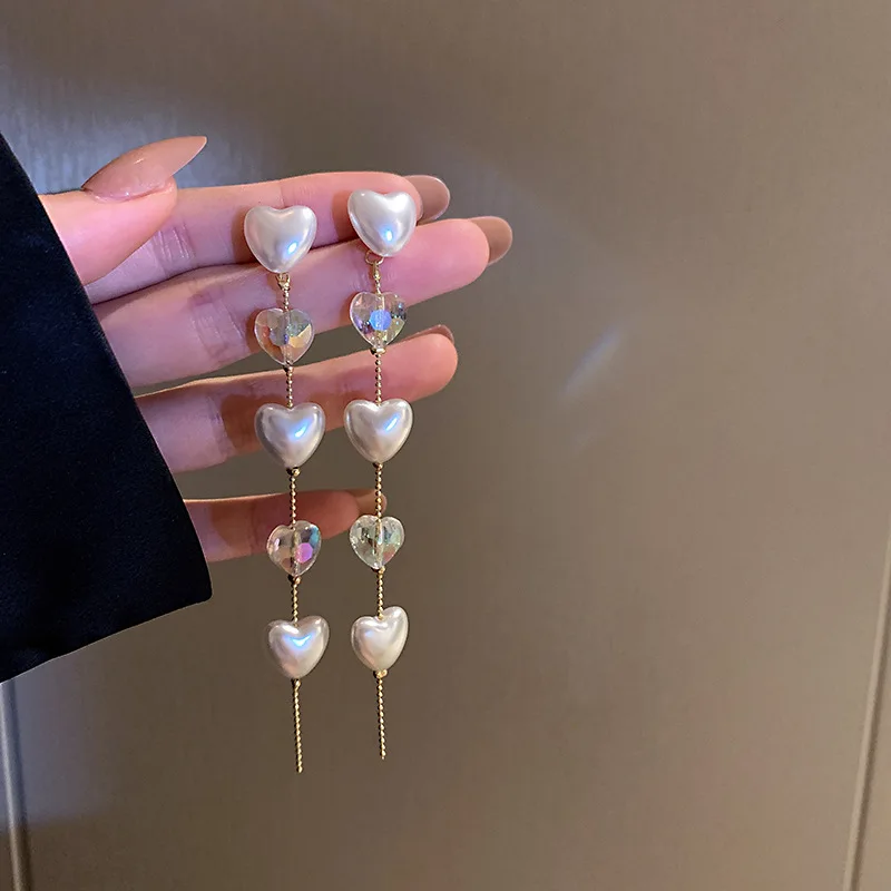 French Crystal Love Pearl Tassel Temperament Long Super Fairy Lady Fashion Light Luxury Earrings
French Crystal Love Pearl Tassel Temperament Long Super Fairy Lady Fashion Light Luxury Earrings