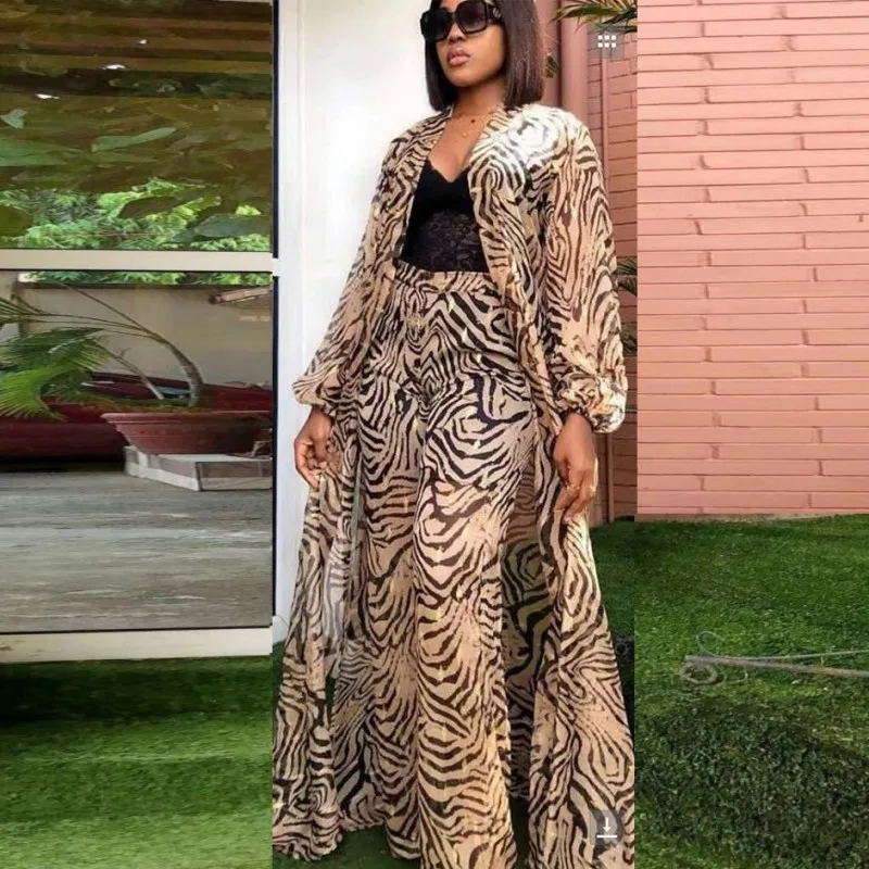 African Clothes For Women 3 Piece Sets Long Tops And Wide Leg Pants With Tank 2021 Fashion New Streetwear Africa Clothing Suits
African Clothes For Women 3 Piece Sets Long Tops And Wide Leg Pants With Tank 2021 Fashion New Streetwear Africa Clothing Suits