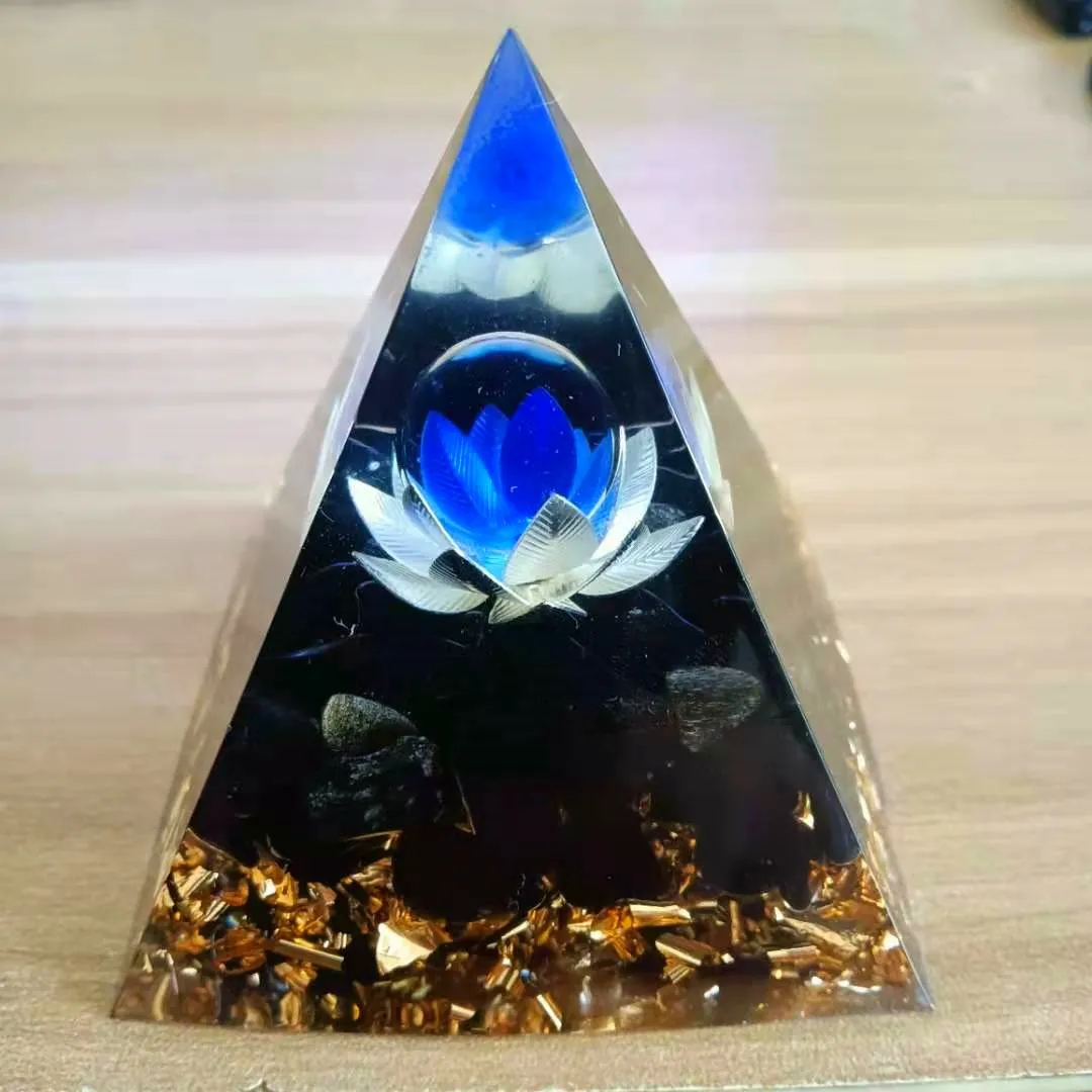 Orgonite foreign trade aogen pyramid ornament natural stone lotus energy pyramid Bring good luck
Orgonite foreign trade aogen pyramid ornament natural stone lotus energy pyramid Bring good luck