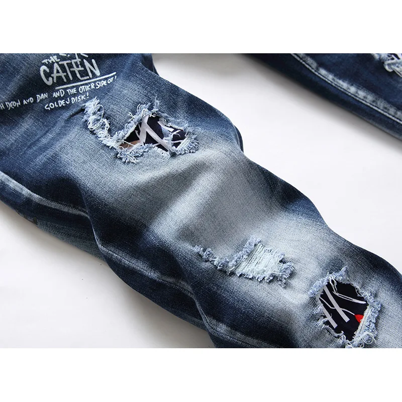 Personality Youth Ripped Patchwork Jeans Hip Hop Letter Print Elastic Cowboys Trousers Fashion Men's Straight Slim Denim Pants
Personality Youth Ripped Patchwork Jeans Hip Hop Letter Print Elastic Cowboys Trousers Fashion Men's Straight Slim Denim Pants